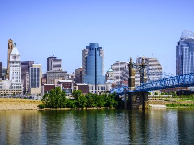 Cincinnati Skyline and John Roebling Bridge Photo of Cincinnati skyline, John A. Roebling bridge, and downtown city office buildings including Great American Insurance Group Tower, Omnicare building, Scripps Center building, PNC Tower Building, Carew Tower, US Bank Building, and Fifth Third Bank building. Photo is high resolution and was taken in July 2012.